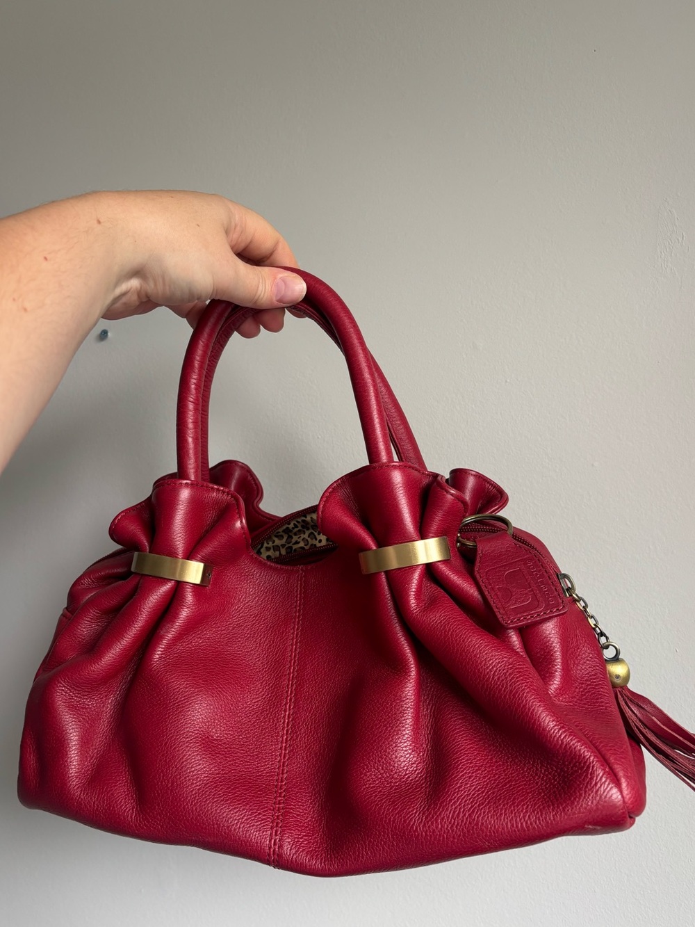 SOPRANO red leather satchel with gold hardware and cheetah interior